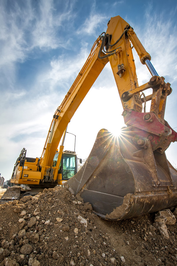 Excavator at work on a Long Island construction site